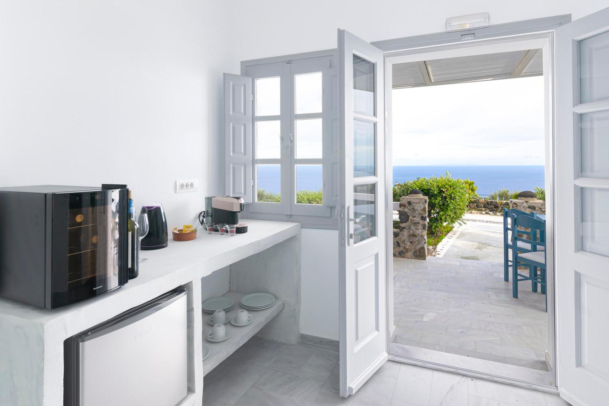 אימרוביגלי Phaos Santorini Suites מראה חיצוני תמונה